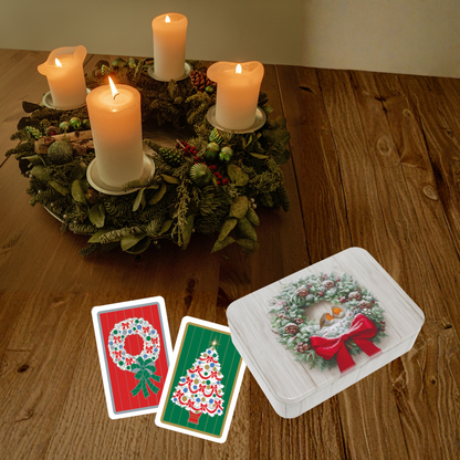 Spielkarten in weihnachtlicher Blechdose
